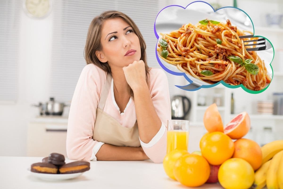 donna a dieta che pensa a un piatto di spaghetti